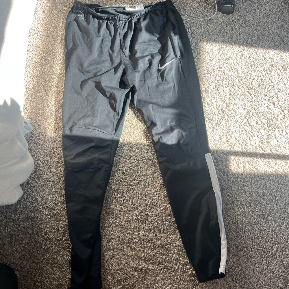 Nike Black Joggers with White Stripe